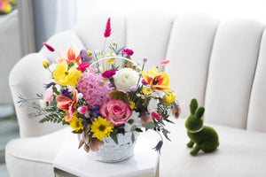 White easter basket floral centrepiece