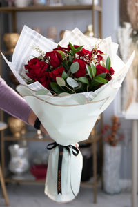 Hand tied roses Deluxe with waterproof wrapping by House of Fiori in Vancouver and Red Deer Studio