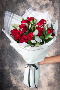 Hand tied roses Deluxe with waterproof wrapping by House of Fiori in Vancouver and Red Deer
