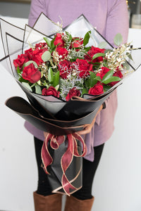 Hand tied roses Deluxe with waterproof wrapping by House of Fiori in Vancouver and Red Deer