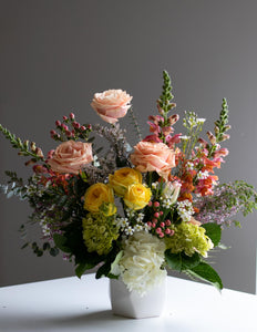 Spring Floral Centrepieces in White Ceramic Vase at House of Fiori Vancouver and Red Deer Studio