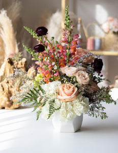 Spring Floral Centrepieces in White Ceramic Vase at House of Fiori Vancouver and Red Deer Studio